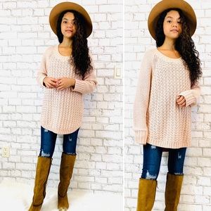 Calvin Klein pink knit sweater.